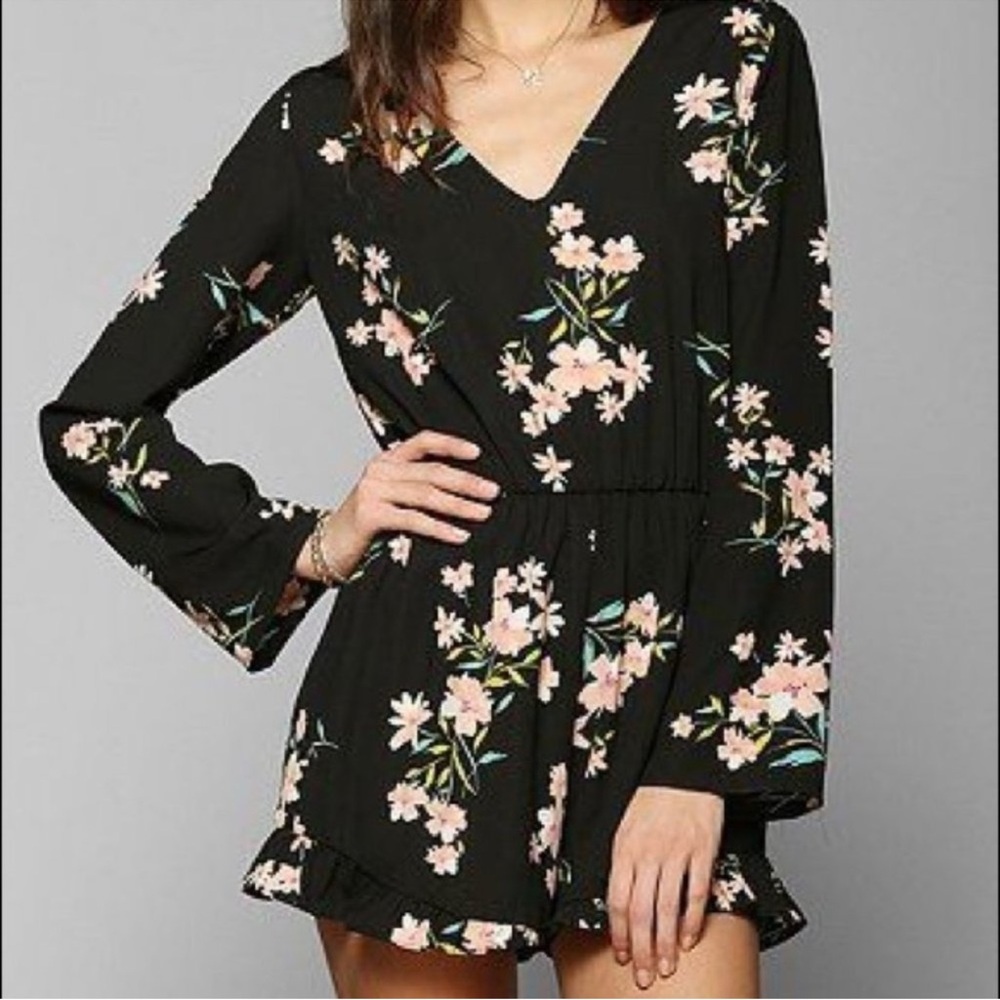 Pins and Needles size m Floral Black v neck romper w ruffle detail leg Anthro